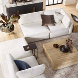 A wooden rustic coffee table complementing the modern living room decor