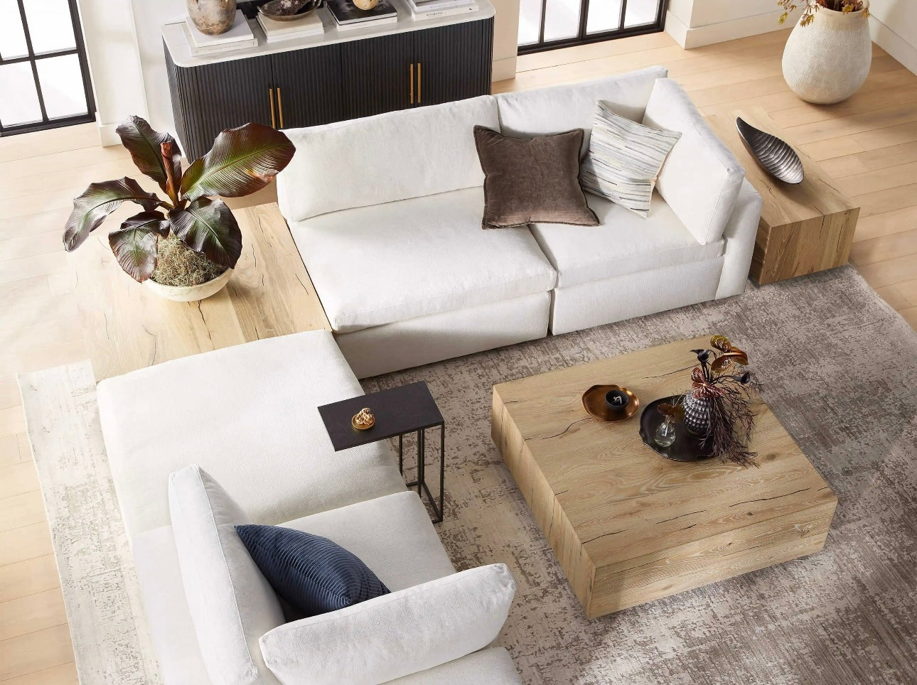 A wooden rustic coffee table complementing the modern living room decor