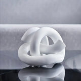 Twisted Sculpture Knot by Roman