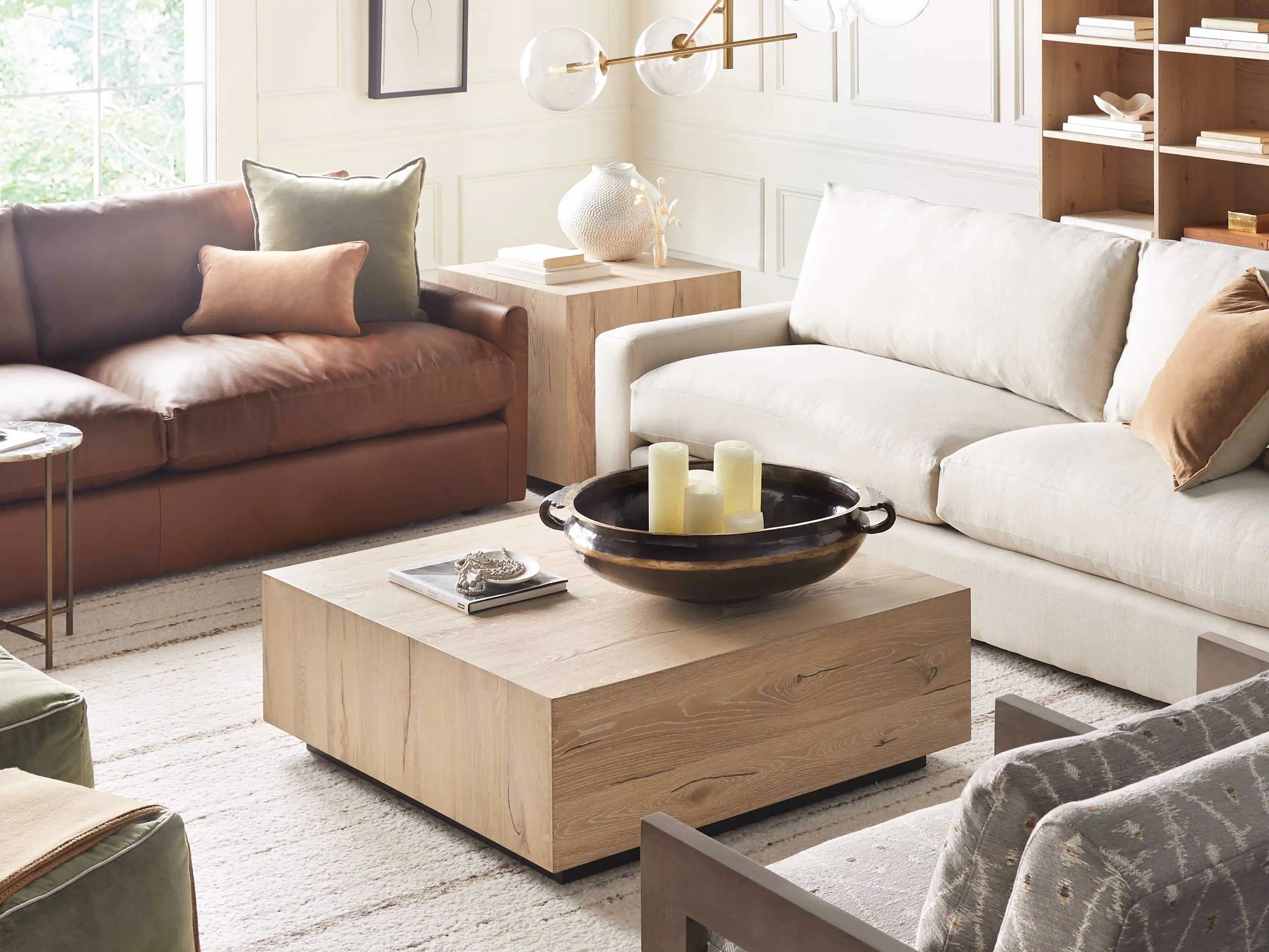 Luxury home featuring a prominent wooden rustic coffee table.