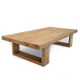 Rectangular wood coffee table with a spacious top and robust legs