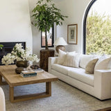 Modern rectangular wood coffee tableElegant living room with a rectangular wood coffee table in natural light